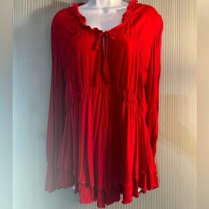 Boston Proper red top with flowing sleeves.